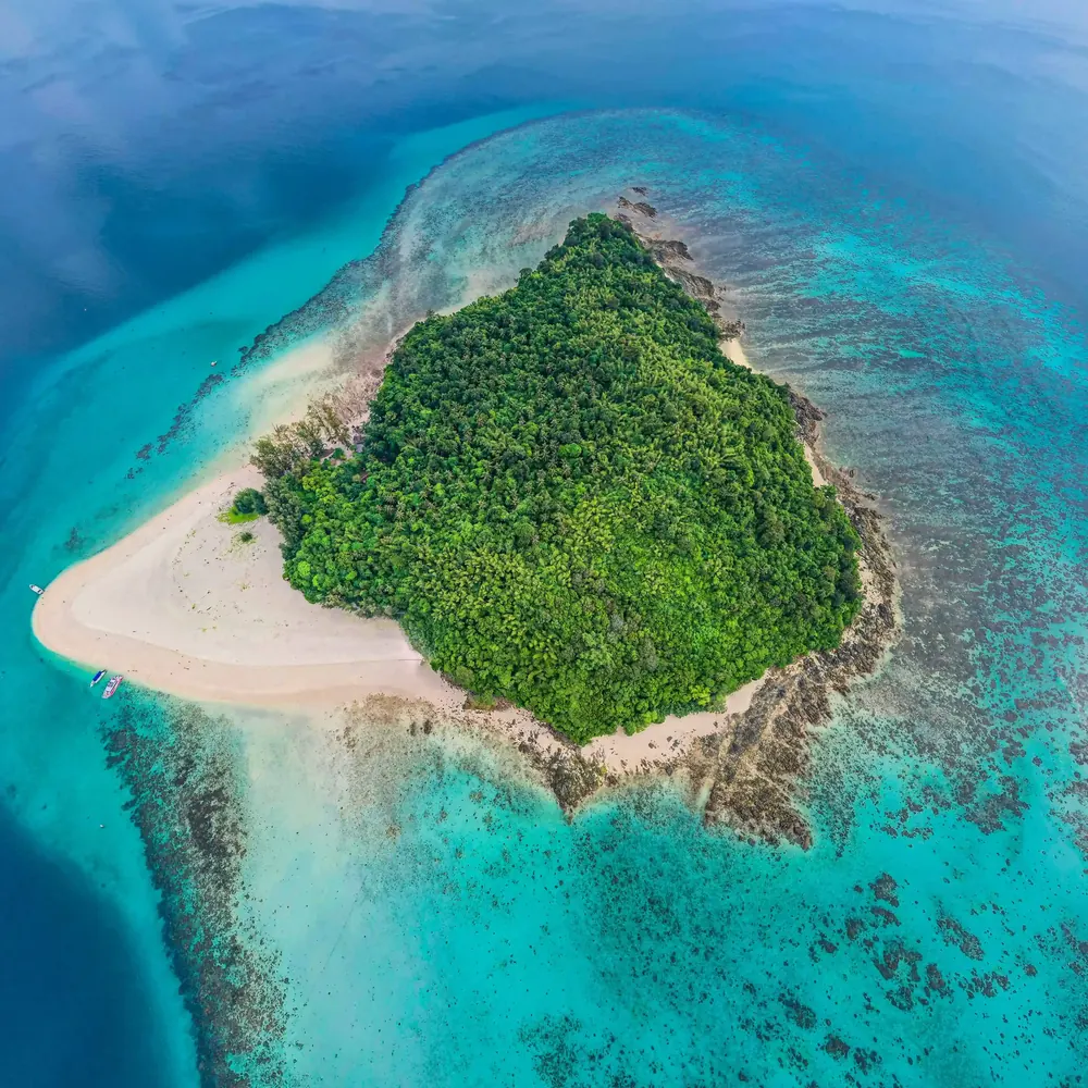 Aerial view of Bamboo Island and its white beach