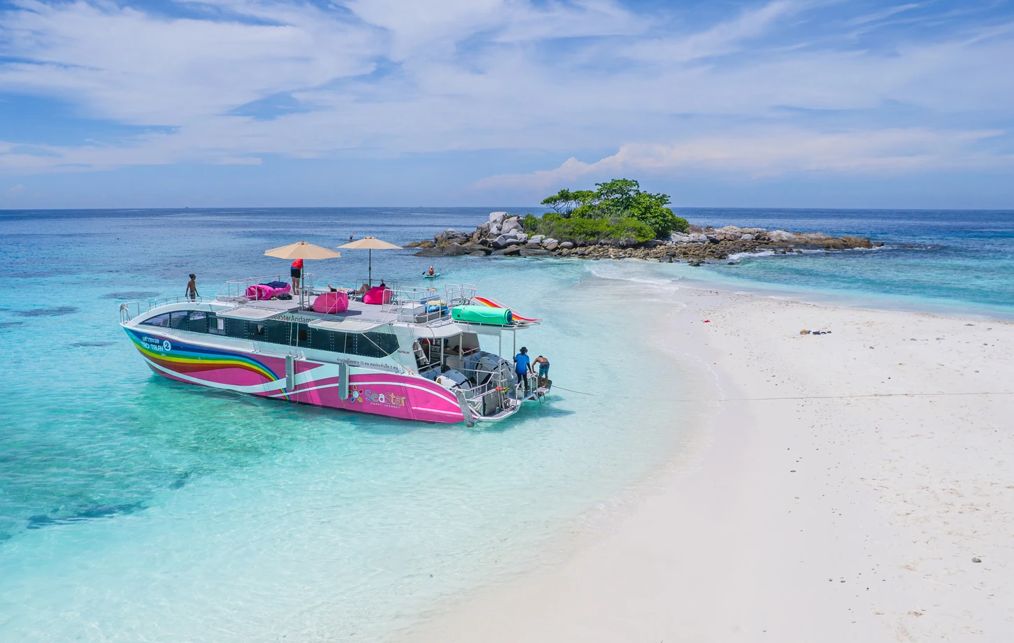 Bright tropical beach and speedboats in the Racha Islands