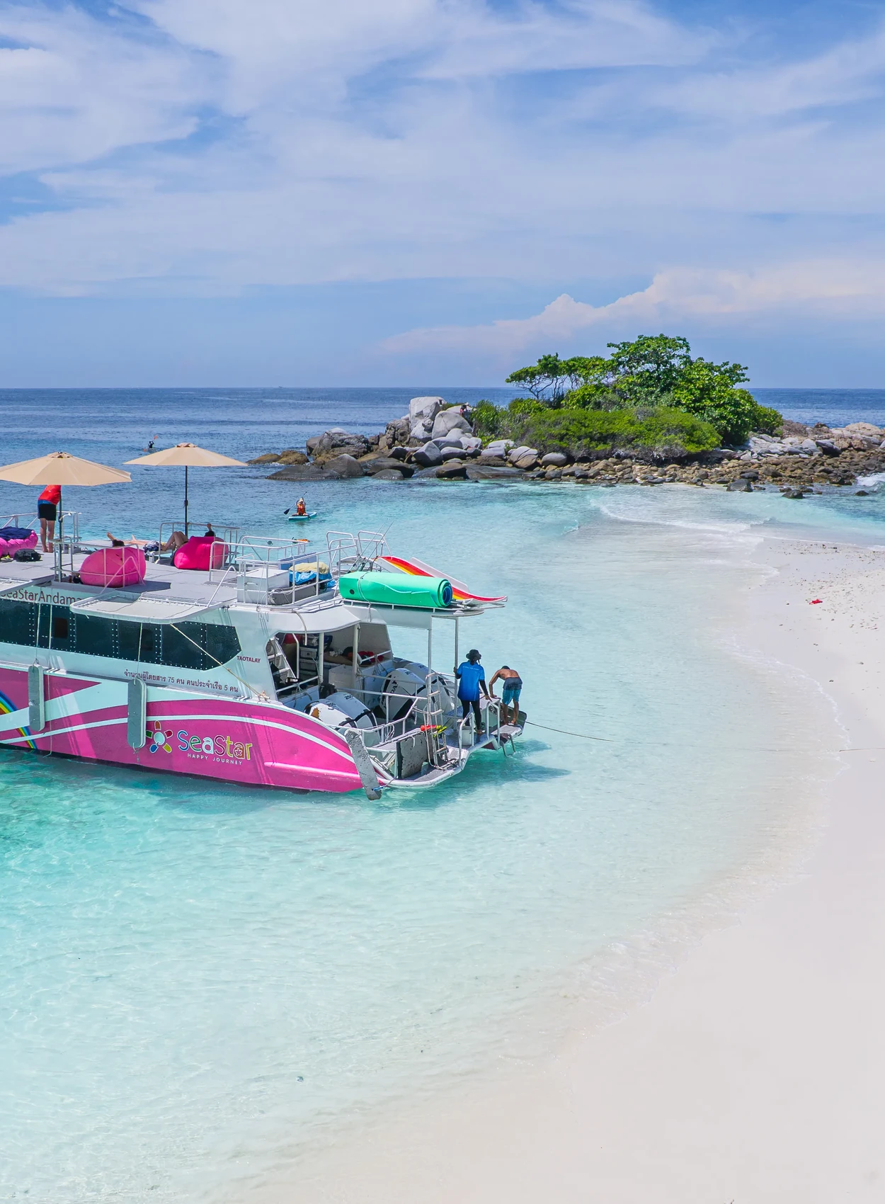 Bright tropical beach and speedboats in the Racha Islands