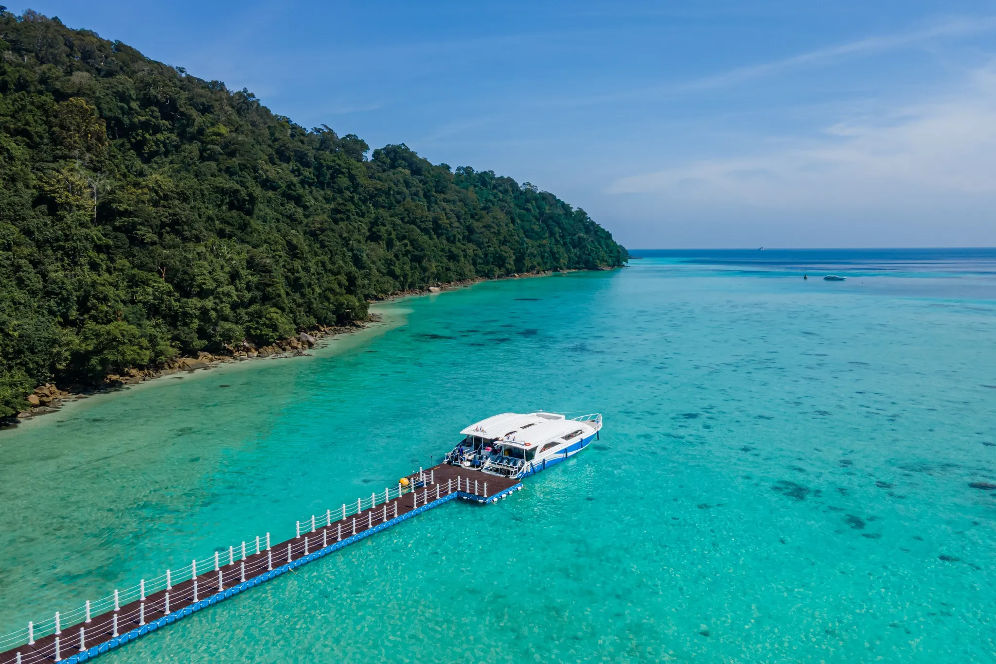 Turquoise bay and speedboat in the Surin Islands